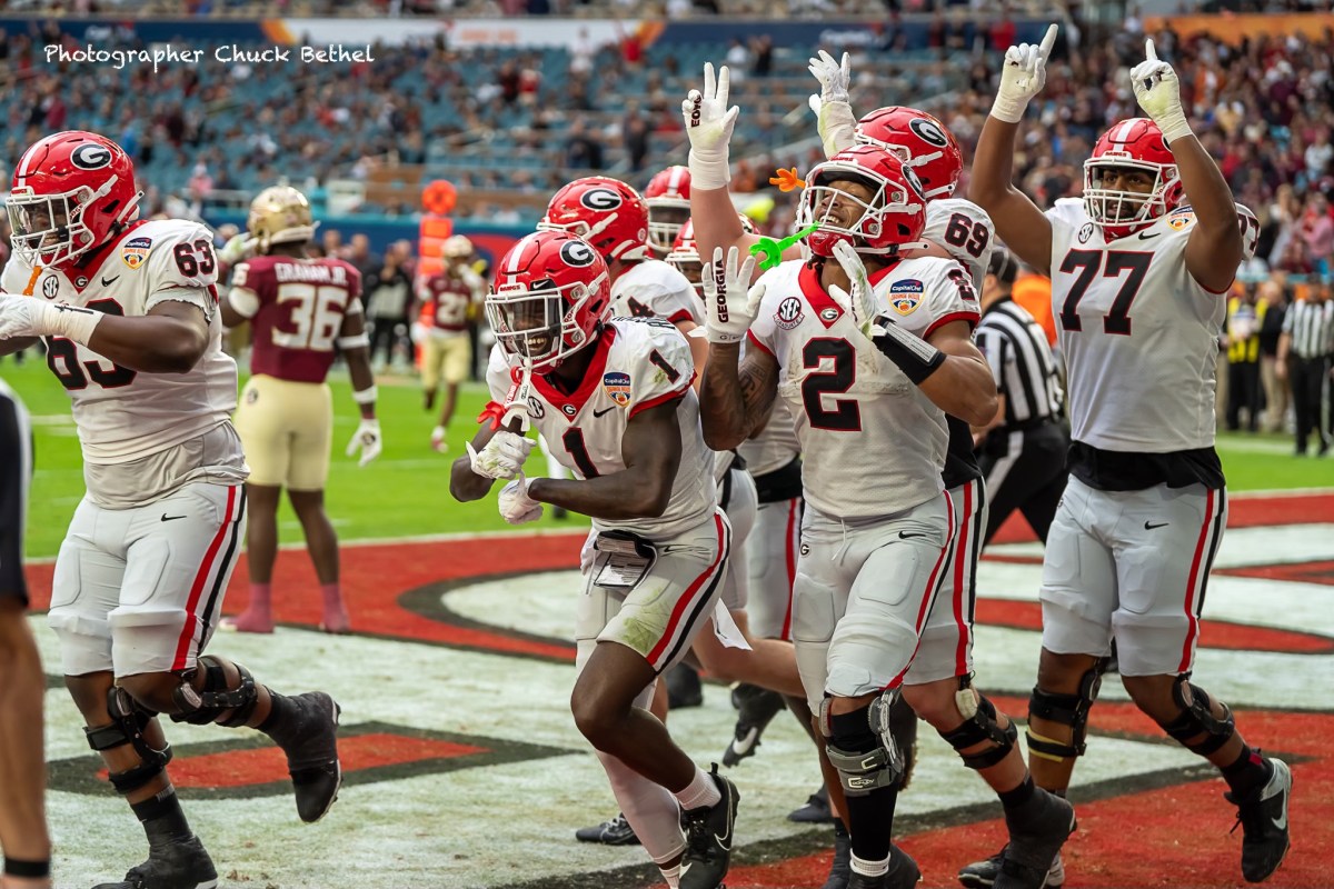 Georgia Bulldogs emerged as victors in the Orange Bowl, taking down the Florida State Seminoles with a resounding 60-point victory
